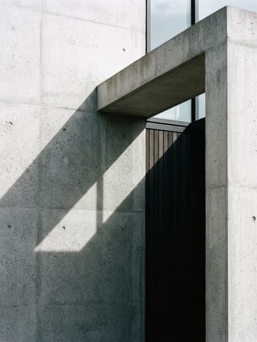 Architectural detail of a minimalist concrete pavilion with sharp geometric shadows and soft daylight, 35mm photography