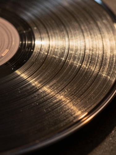 Extreme close-up macro shot of a gold vinyl record groove reflecting sharp directional light, high shadow depth, cinematic dark atmosphere.
