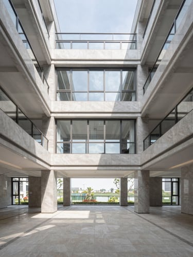Architectural photography of a luxury apartment interior, crisp natural daylight, cool desaturated tones, wide-angle lens, symmetrical composition, sharp focus