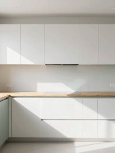 Bright interior photography of a sunlit, immaculate kitchen, soft natural daylight, clean white and sage green tones, sharp focus, 35mm straight-on architectural angle, wooden countertops, negative space on the left
