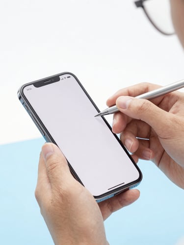 Close-up of a technician's hands inspecting a clean smartphone under bright studio light, white and pale blue background, high-key photography