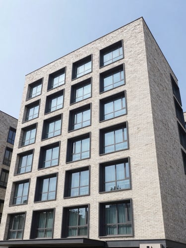 A sharp architectural photograph of premium modern independent floors in Gurugram, showcasing clean brick and glass facades under bright natural daylight.