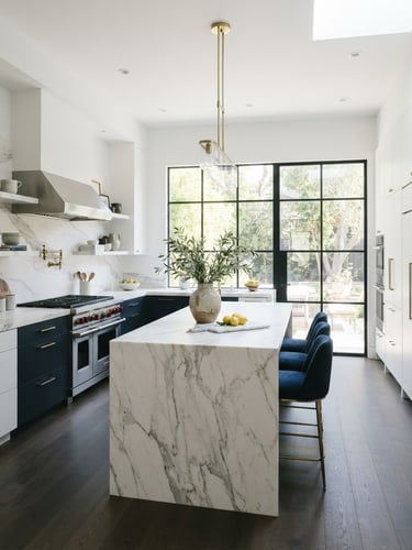 Bright architectural photography of a luxury kitchen with marble countertops and minimalist design, soft natural daylight streaming through large windows, pristine and immaculate.