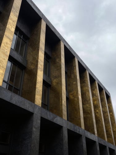 Low-angle dramatic editorial photography of a modern courthouse facade in Mexico City, overcast sky, sharp architectural lines, 35mm