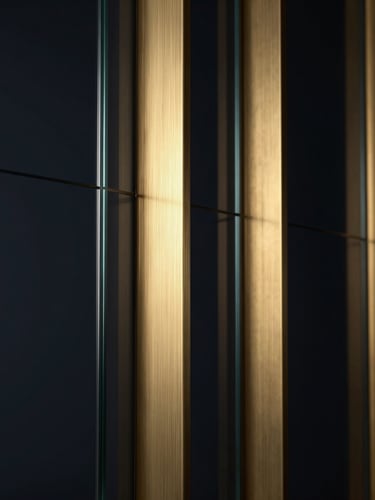 Macro close-up of dark glass panels and brushed brass pillars, dramatic low-key studio lighting with soft gold glow, premium 3D render