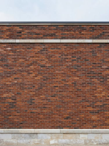 Straight-on architectural photograph of a perfectly maintained brick facade with clean limestone trim, soft overcast daylight, sharp focus on structural details