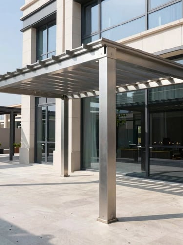Wide-angle architectural exterior shot of installed premium aluminum pergolas and modern lambrines on a luxury commercial terrace, sharp daylight casting clean geometric lines.