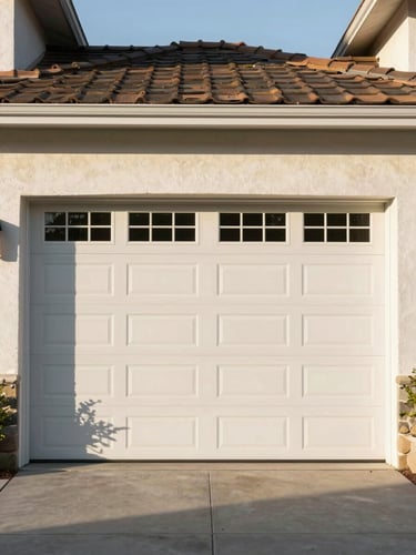 Symmetrical eye-level shot of a clean modern residential garage door in Citrus Heights, warm afternoon natural daylight, crisp details.