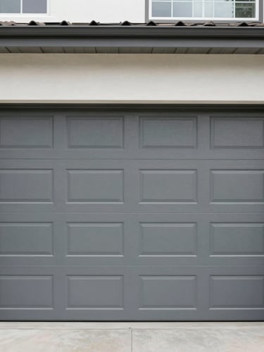 A crisp, straight-on architectural shot of a modern gray residential garage door in Citrus Heights, clean lines, natural daylight, eye-level framing.
