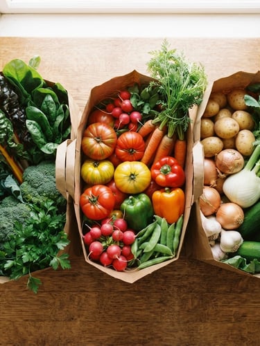 Top-down flat lay of neatly packed brown paper grocery bags filled with fresh vibrant vegetables, bright natural daylight, warm editorial food photography