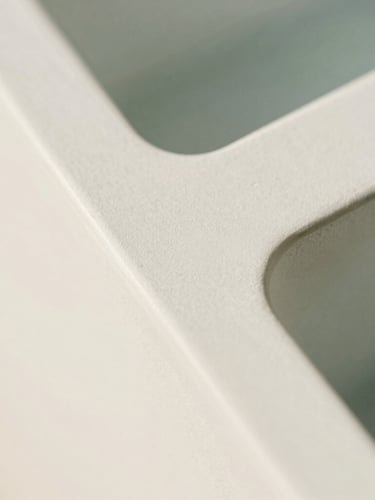 Macro detail of a clean technical interface, soft daylight, warm tones, minimalist geometric composition, 35mm