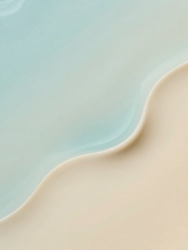 Abstract fluid art with smooth waves of soft cyan blue and warm cream, soft diffused daylight, shallow depth of field, minimalist composition