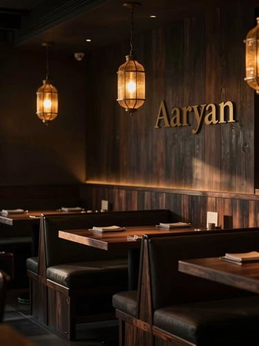 Moody shot of the warm-lit interior of Aaryan, sophisticated dark wood seating, soft golden glow from hanging lanterns, intimate atmosphere, 35mm