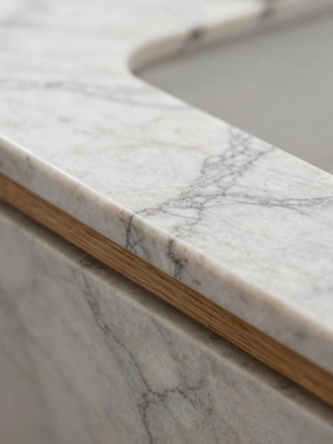 Macro detail of premium white marble and natural teak wood textures, architectural shadows, soft natural side lighting.