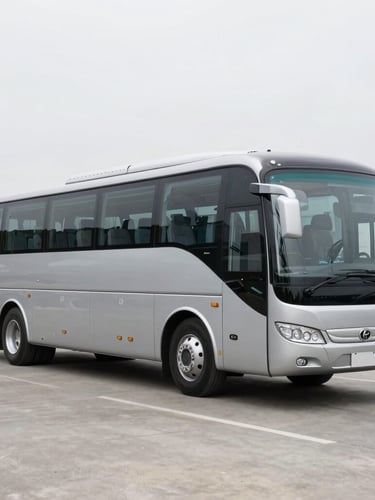 Three-quarter profile of a spotless luxury passenger coach parked on clean pavement under bright overcast daylight, professional commercial automotive photography