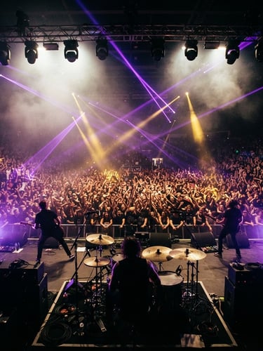Dynamic low-angle shot of a massive concert crowd from behind the stage, electric purple laser beams cutting through haze, vibrant gold spotlights, high-contrast, 35mm film grain