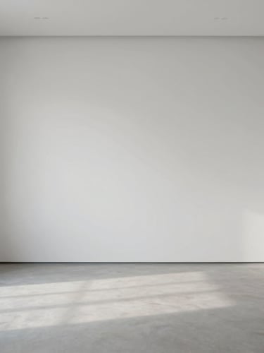 An empty white-walled exhibition space with soft diffused daylight casting gentle shadows, minimal museum archive aesthetic, neutral tones, sharp focus, 50mm