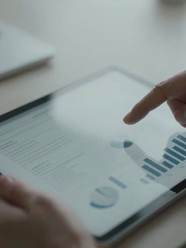 Extreme close-up of hands reviewing a structured business diagram on a tablet, cool soft overcast daylight, desaturated slate and steel tones, 35mm lens