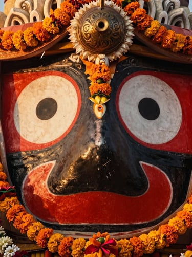 Majestic close-up of Lord Jagannath's large eyes, decorated with traditional vermilion and marigold garlands, warm golden-hour temple torchlight, 35mm lens