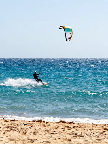 Dynamic low angle of a kiteboarder flying over deep turquoise Red Sea water, harsh coastal sunlight reflecting off spray, 35mm lens