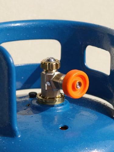 Bright close-up of a vibrant blue gas cylinder with a bright orange safety seal on its valve, clean background, sharp focus, sunny daylight.
