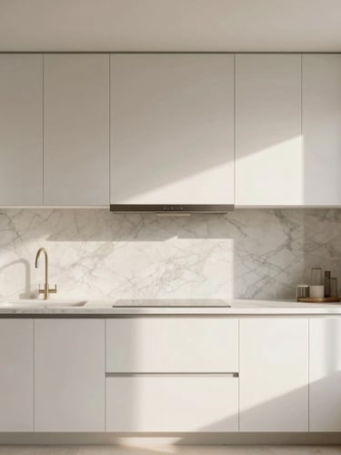 Straight-on architectural photograph of a minimalist kitchen remodel, marble slab backsplash, crisp white oak cabinetry, soft morning light.