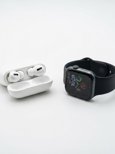 Modern wireless earbuds and a sleek smartwatch on a clean white surface, bright studio light, sharp focus, wide shot capturing both devices, 50mm