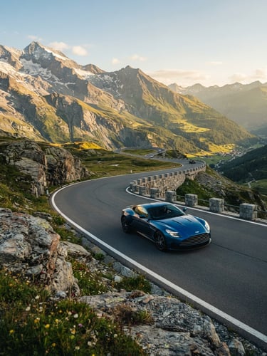 A modern luxury touring car driving through a winding mountain pass in the Alps, bright natural golden-hour sunlight, cinematic wide-angle 35mm photography