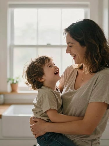 A Columbus mother and her child laughing in a bright, comfortable kitchen, soft morning window light, authentic expressions, 35mm