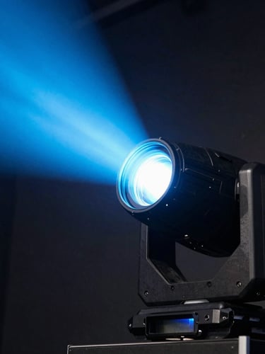 Close-up of a professional moving head stage light fixture, sharp focus on the lens and rugged black metal casing, dramatic light blue volumetric beam cutting through dark haze, 35mm lens