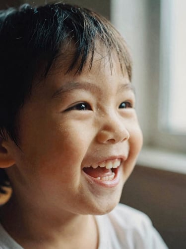 Close-up portrait of a child laughing during a festive event, soft natural light from a window, warm tones, shallow depth of field, tactile texture of photo paper.