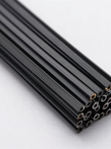 Macro photograph of high-tensile black nylon cable ties neatly bundled in a clean industrial warehouse, sharp focus on technical markings, cool metallic lighting