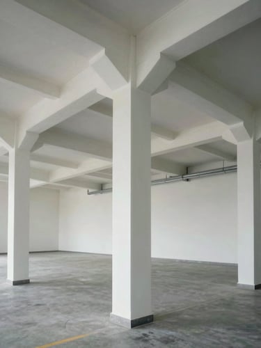 Straight-on architectural shot of a clean commercial facility interior, high-key lighting, razor-sharp paint lines on structural steel columns.