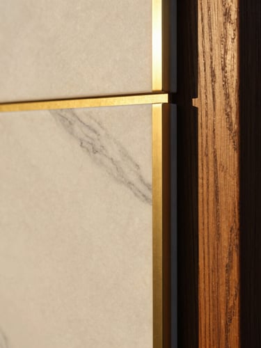 Close-up shot of premium materials, white marble with grey veins meeting brushed gold brass inlay and dark structured oak wood