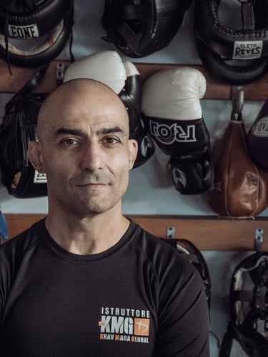 Massimo Fenu Krav Maga Global Expert with the official KMG Italy t-shirt