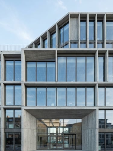 Clean architectural photography of a modern minimalist corporate headquarters facade, sharp concrete lines, glass windows reflecting bright daylight, cool tones, 35mm lens