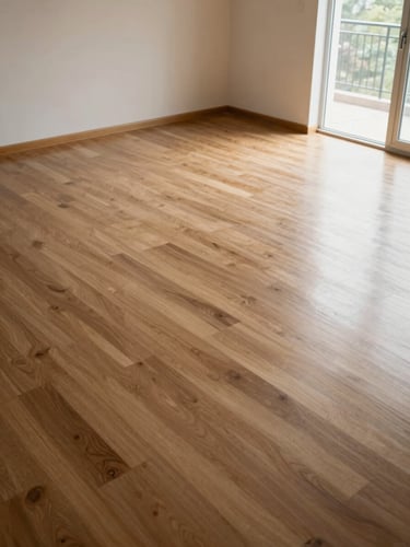Wide shot of a freshly cleaned empty living room, daylight entering through open window on the right, polished floor reflecting soft light, no people, surfaces visibly clean — overhead angle capturing the whole floor expanse
