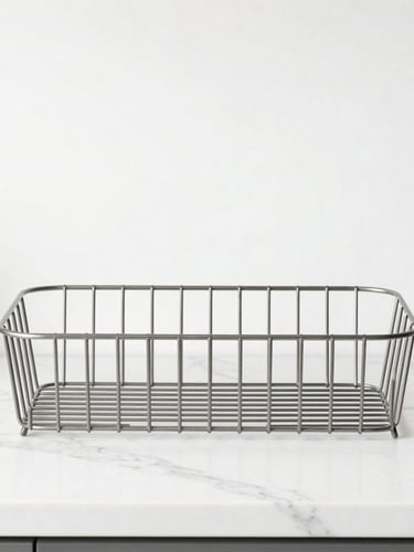 Straight-on clean product photography of desaturated descaled metal kitchen organizers on a white marble counter, bright overcast daylight, sharp focus, desaturated cool tones