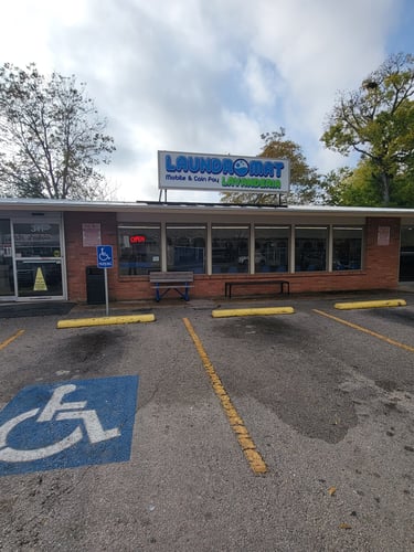 Steel Drum Laundry storefront and free parking at 311 W. Hopkins St. in San Marcos, TX