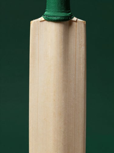 Macro shot of a cricket bat face, showing the clean, straight grains of grade-one English willow, dramatic studio lighting, deep forest green background, 50mm lens