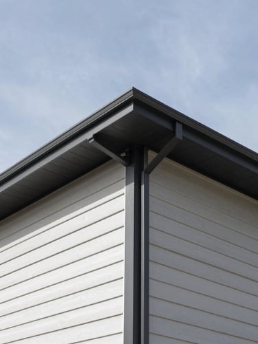 sharp architectural photography, bright natural daylight, close-up of clean siding joints on a modern Calgary home under dramatic Alberta skies