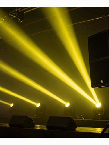 Atmospheric low-light venue with sharp electric-acid yellow light beams cutting through haze, illuminating professional sound systems, high-contrast, technical aesthetic