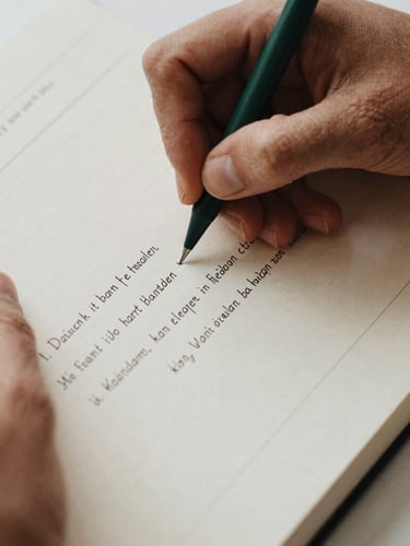 Macro overhead shot of hands writing precise German grammar charts in a neat notebook, soft natural overcast daylight, warm cream paper, minimalist editorial style, 35mm film aesthetic