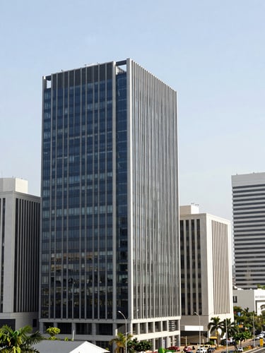 Architectural shot of the modern business district skyline of Abidjan, Côte d'Ivoire, reflecting bright daylight, clean lines, professional corporate atmosphere, 35mm lens