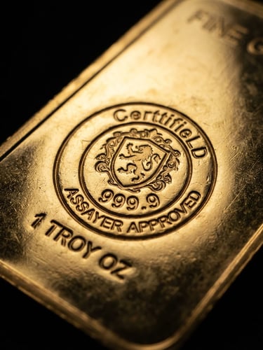 Macro close-up of a pure gold bullion bar showing certified stamp, dramatic low-key lighting, deep black background, sharp gold reflections, high contrast, 85mm lens