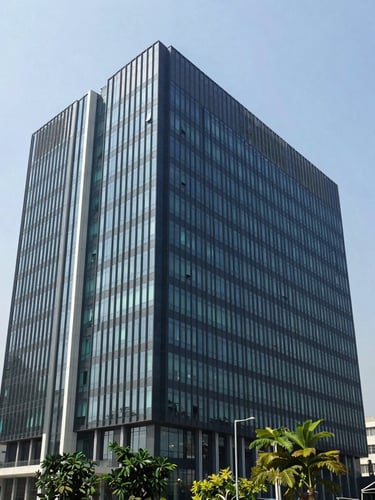 Architectural shot of a modern corporate office building in Bengaluru, bright clean daylight, professional corporate photography, 35mm