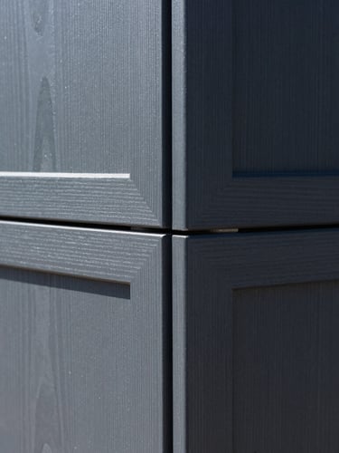 Crisp architectural detail of interlocking premium hardwood joints, bright natural daylight, clean charcoal tones, sharp focus, 35mm lens