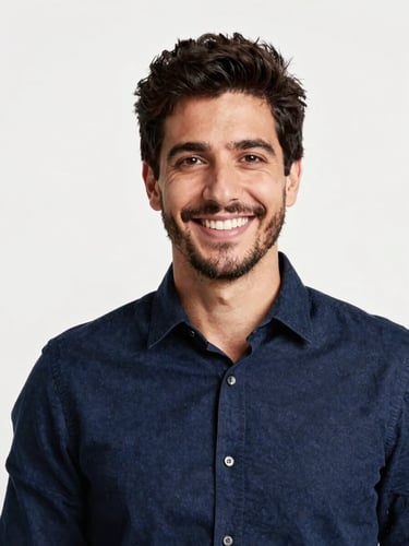 Professional studio portrait of Leandro, a friendly male digital agency founder in a dark blue shirt, smiling, bright natural daylight, clean background