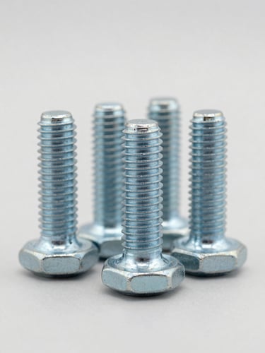 Straight-on technical close-up of heavy-duty industrial fasteners, bright clean studio lighting, neutral grey background, sharp focus, 50mm lens, showcasing thread-count precision of steel bolts.