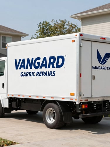 Clean, branded Vanguard Garage Door's Repairs Crew service truck parked in a residential driveway, bright natural daylight, crisp editorial photography, 35mm
